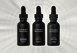 White text that reads "gold standards" with Vivant Skin Care products around it