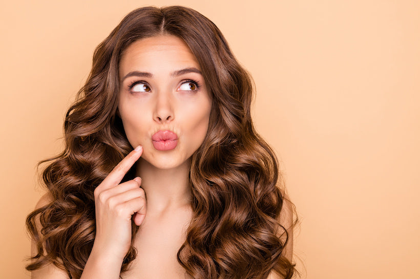 Woman puckering her lips